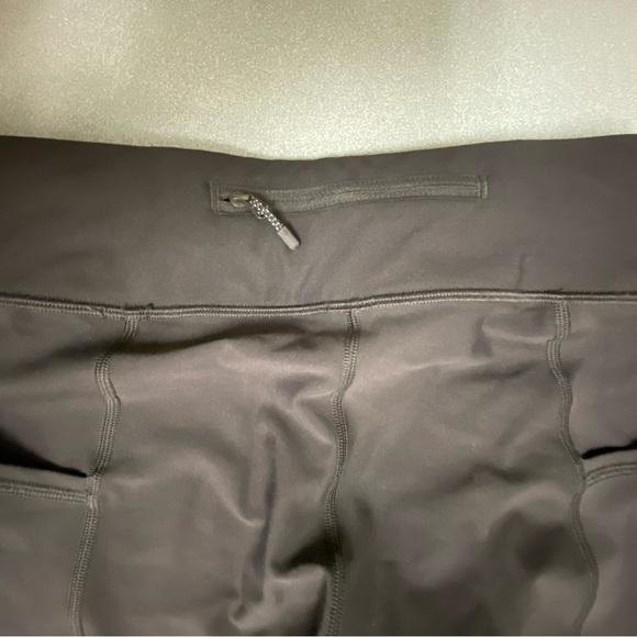 Like new Lululemon compression leggings clamshell ankle length. Reflective. - Picture 2 of 5
